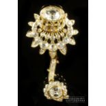 A fine old cut diamond and 18ct gold brooch, c1970, designed as a large flower, the stamen set