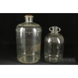A large colourless glass apothecary's jar; and a demijohn bottle (2)