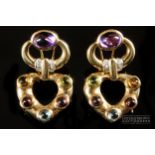 A pair of 14ct gold, diamond and gem set earrings, of heart and scroll design, collet set with