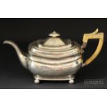 An Irish silver large teapot, bombe form on four ball feet, boxwood handle, makers mark for