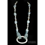 An unusual freshwater pearl, aquamarine and mother of pearl necklace, with irregular faceted