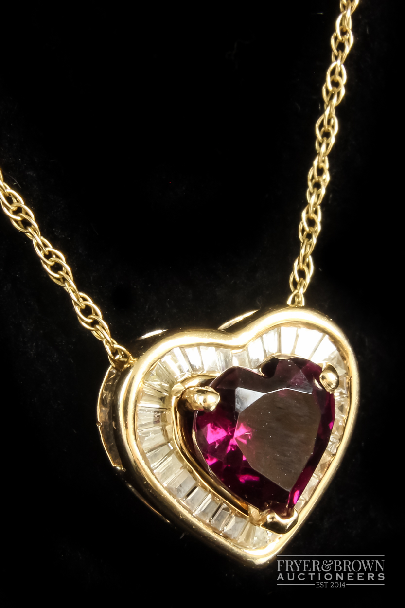 A heart shaped almandine garnet and calibre baguette diamond pendant, the heart shaped garnet of - Image 2 of 3