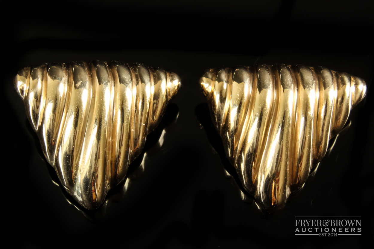 A pair of 1970s 14ct yellow gold ribbed triangular shaped ear clips, approximate total weight 6grs