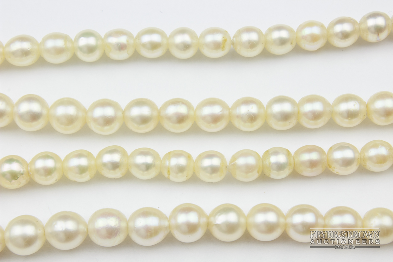 A two row cultured pearl necklace, with tourmaline and diamond clasp, comprising 62 and 66 graduated - Image 6 of 6