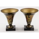 A. Ducobu - a pair of Art Deco bronzed metal vases or table lamps, decorated in gilt and burnt