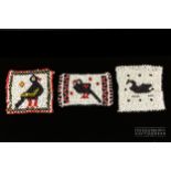 Three North American Indian glass beadwork panels, probably 20th century, of black birds on a