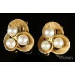 A pair of 1960s 14ct yellow gold and cultured pearl ear clips, of stylised trefoil design, each
