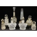 A silver mounted cut glass perfume bottle; a white metal mounted bud vase; and other cut glass