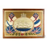 A large sailor's woolwork picture, 19th century, the central reserve of a ship within a laurel and