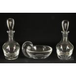Two Steuben teardrop liqueur decanters with air inclusions; and a John Dreves for Steuben shell