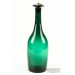 A 19th century emerald green bottle form decanter with everted rim, with silver plated and cork ring