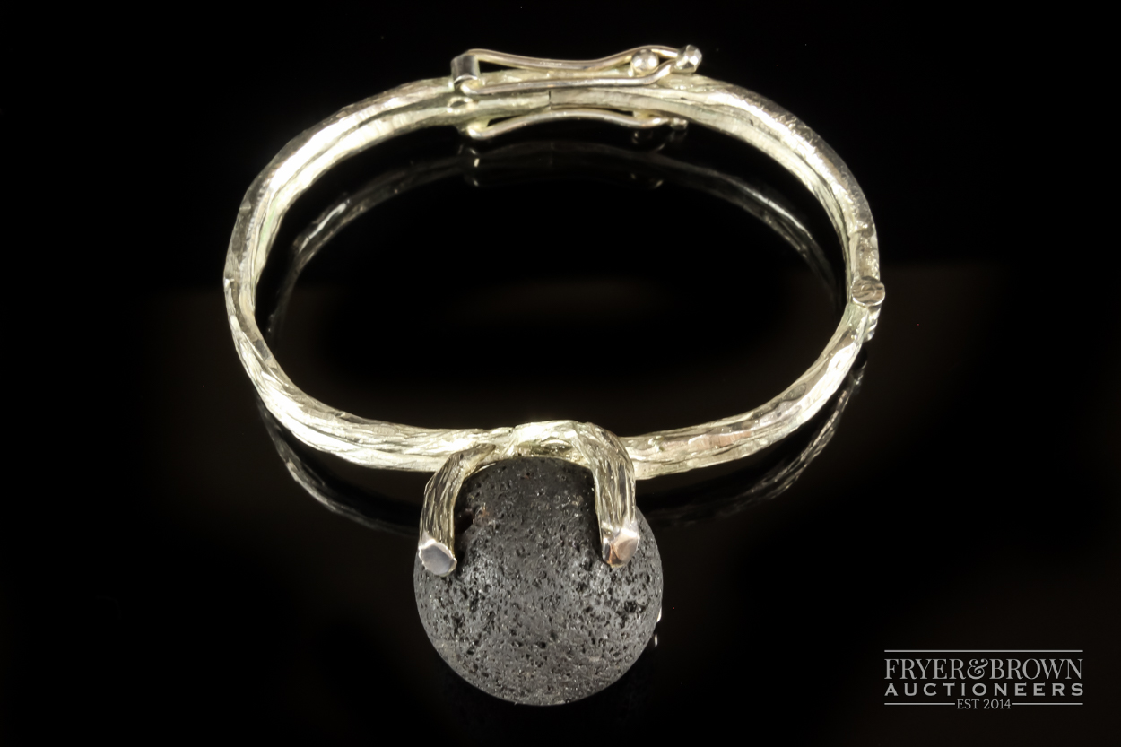 An Icelandic designed and made silver and volcanic rock necklace, bangle and ring, the textured - Image 4 of 6