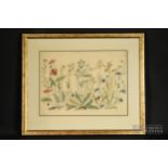 A cross stitch panel, 20th century, worked as wild flowers including poppies, grasses and