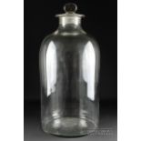 A mid-19th century colourless glass apothecary's storage jar, c1840, 61cm high approx. including