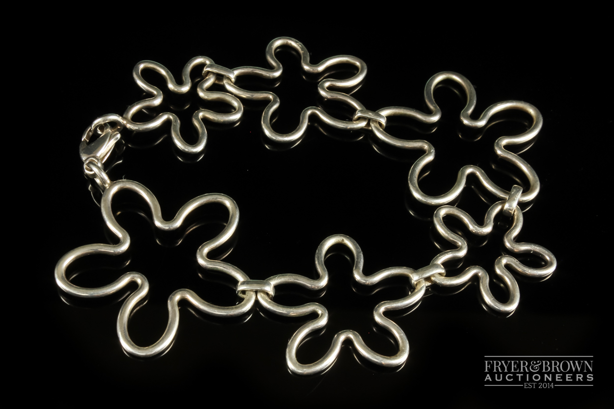 Tiffany & Co. - a silver bracelet, composed of six graduated irregular cinquefoil motifs, signed T & - Image 2 of 3