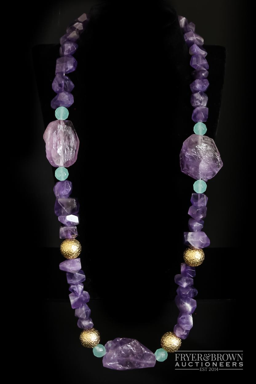 A large amethyst, gilt and faceted chalcedony bead necklace, composed of three large amethyst