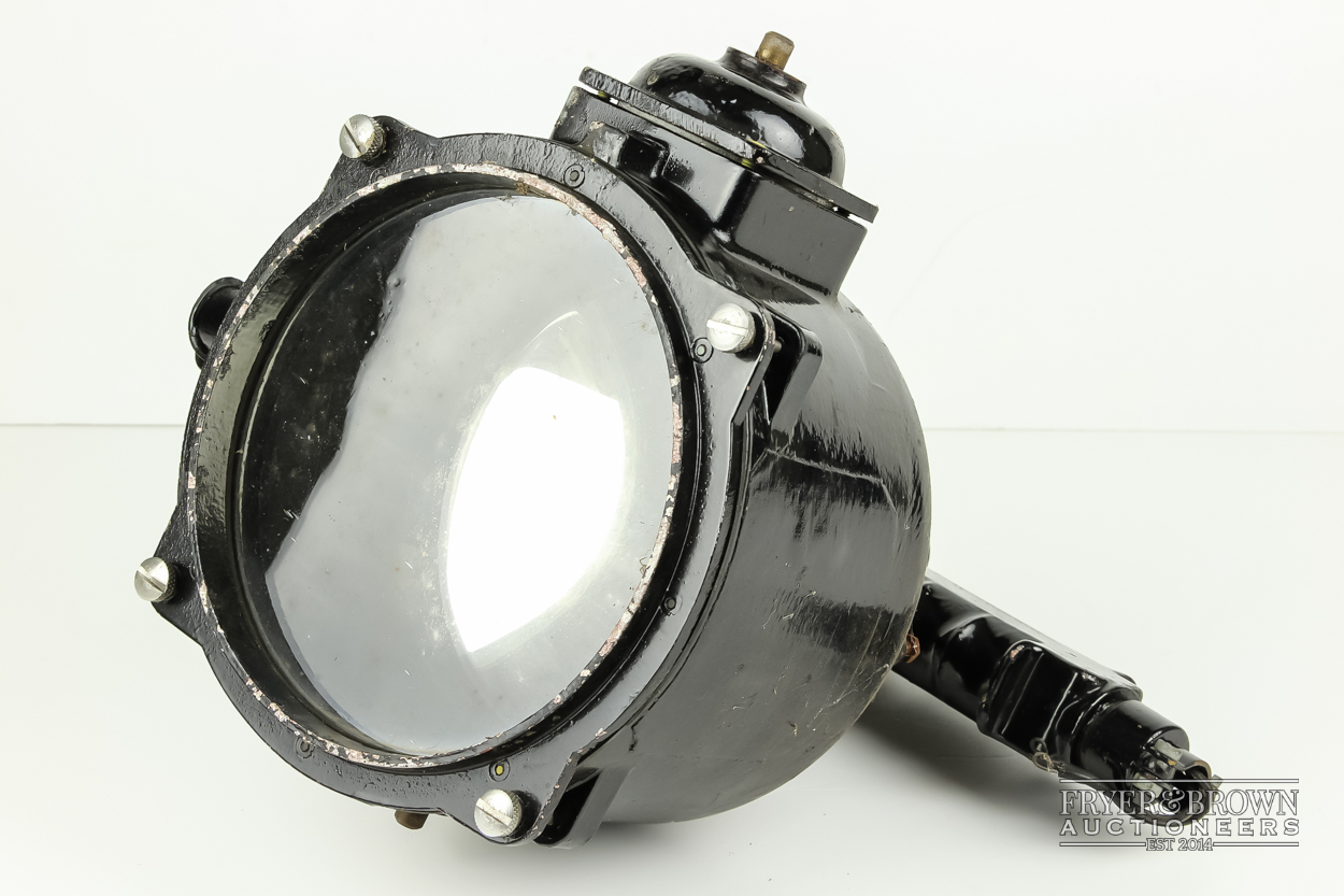 A vintage spotlight, possibly a US naval lamp, patent 5153, 6" lantern, numbered E3672