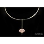 Pianegonda, Italy - a silver and cabochon rose quartz necklace, designed as a narrow silver torc
