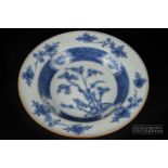 A Chinese blue & white export porcelain deep soup plate, finely painted with a fruiting