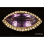 A 15ct gold antique amethyst and split pearl brooch, c1880, the marquise shaped mixed cut amethyst