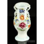 An 18th century European milk/opaque white glass vase, probably German, baluster form with trailed