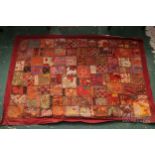 An Indian patchwork and embroidery wall hanging, 133 x 90cm approx.