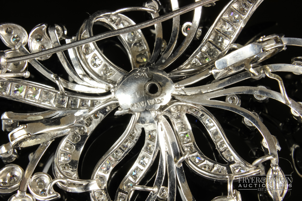 A 1950s diamond and white gold spray brooch/pendant, the bouquet scroll set throughout with - Image 4 of 7