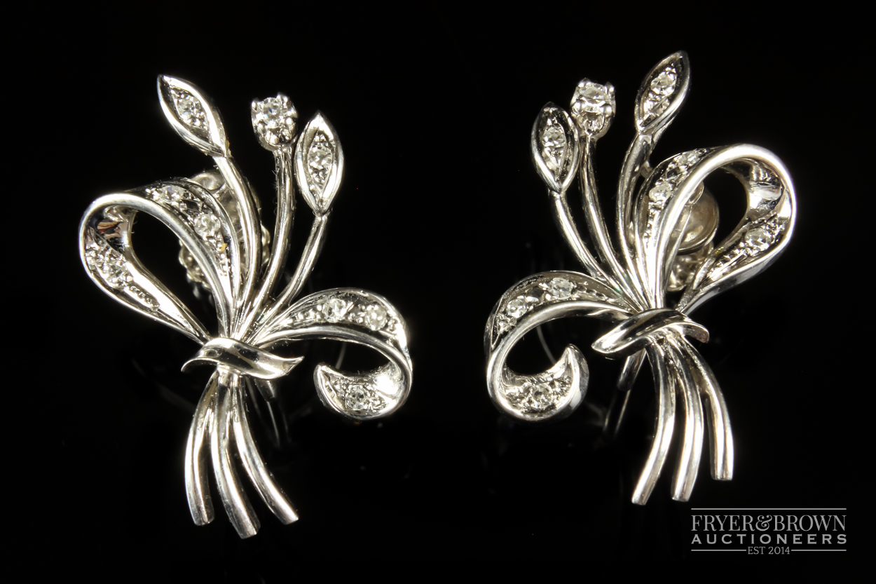 A 1950s diamond and white gold spray brooch/pendant, the bouquet scroll set throughout with - Image 6 of 7