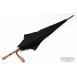 An early 20th century Paragon S. Fox & Co. umbrella, black canopy with makers mark to stretcher, the