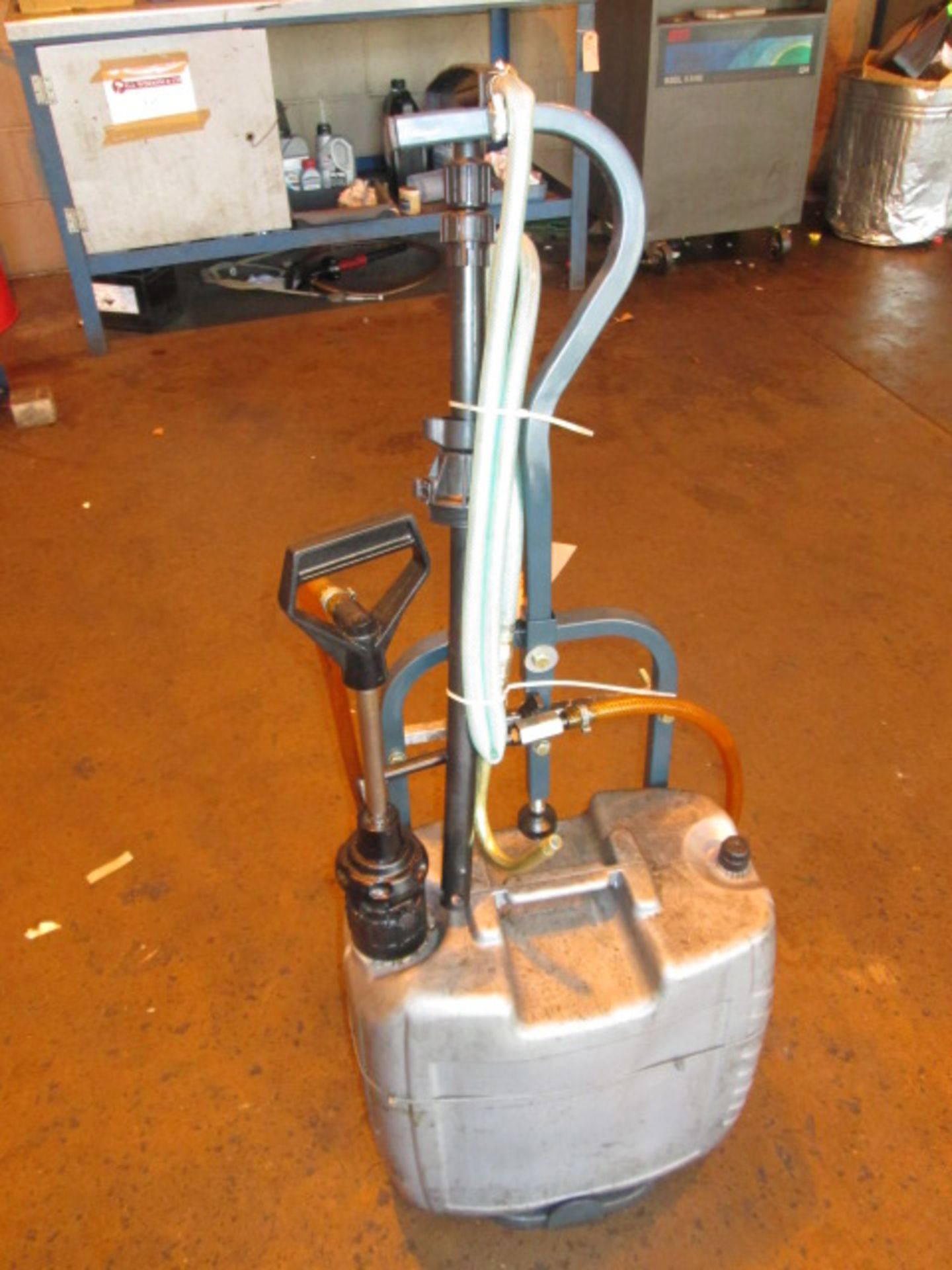 Trolley with Hand Oil Pump. Comes with Spare Pump.