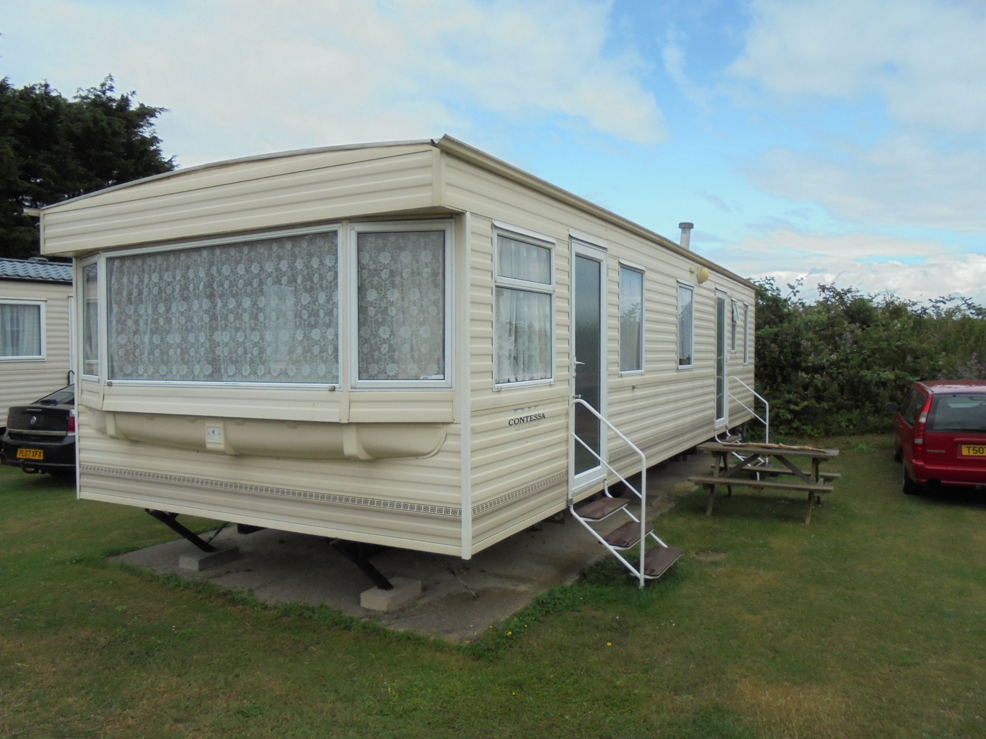 "WARRANT SATISFIED. 'LOT WITHDRAWN" BK Contessa Static Caravan. Size  32ft x 12ft, Year 2004.