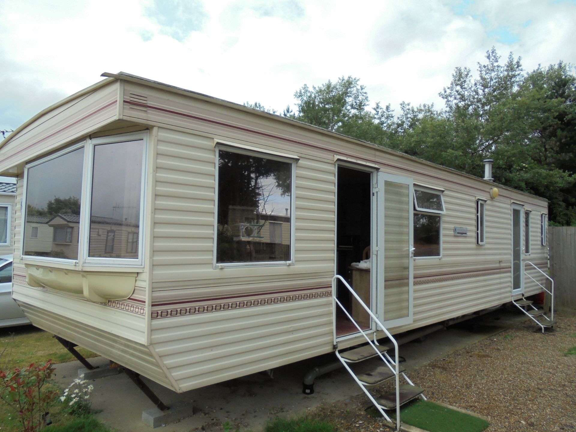 WARRANT SATISFIED. 'LOT WITHDRAWN' Bluebird Charisma Static Caravan. 35ft x 12ft, Year 2000.