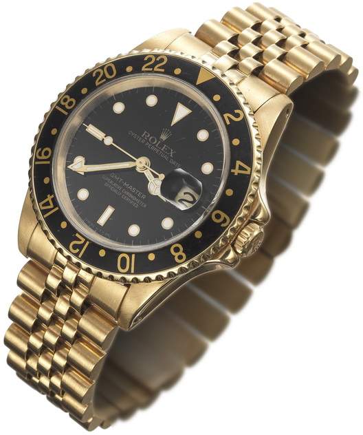 Herrenarmbanduhr der Marke ROLEX "Oyster Perpetual Date GMT-Master" 18K GG
Rundes, massives