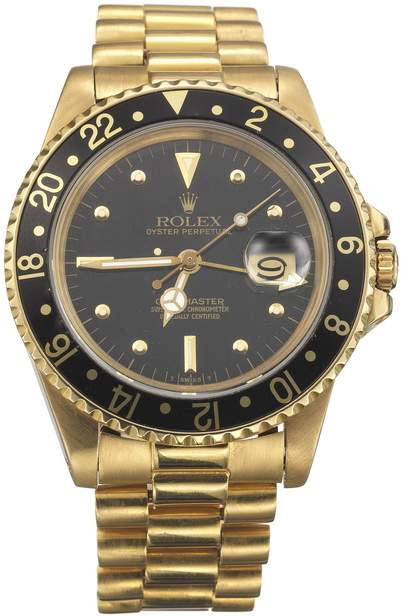 Herrenarmbanduhr der Marke ROLEX "Oyster Perpetual GMT-Master" 18K GG
Rundes, massives