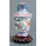 VASE WITH PLAYING BOYS  Porcelain with blue underglaze und enamel color. China, presum. late Qing