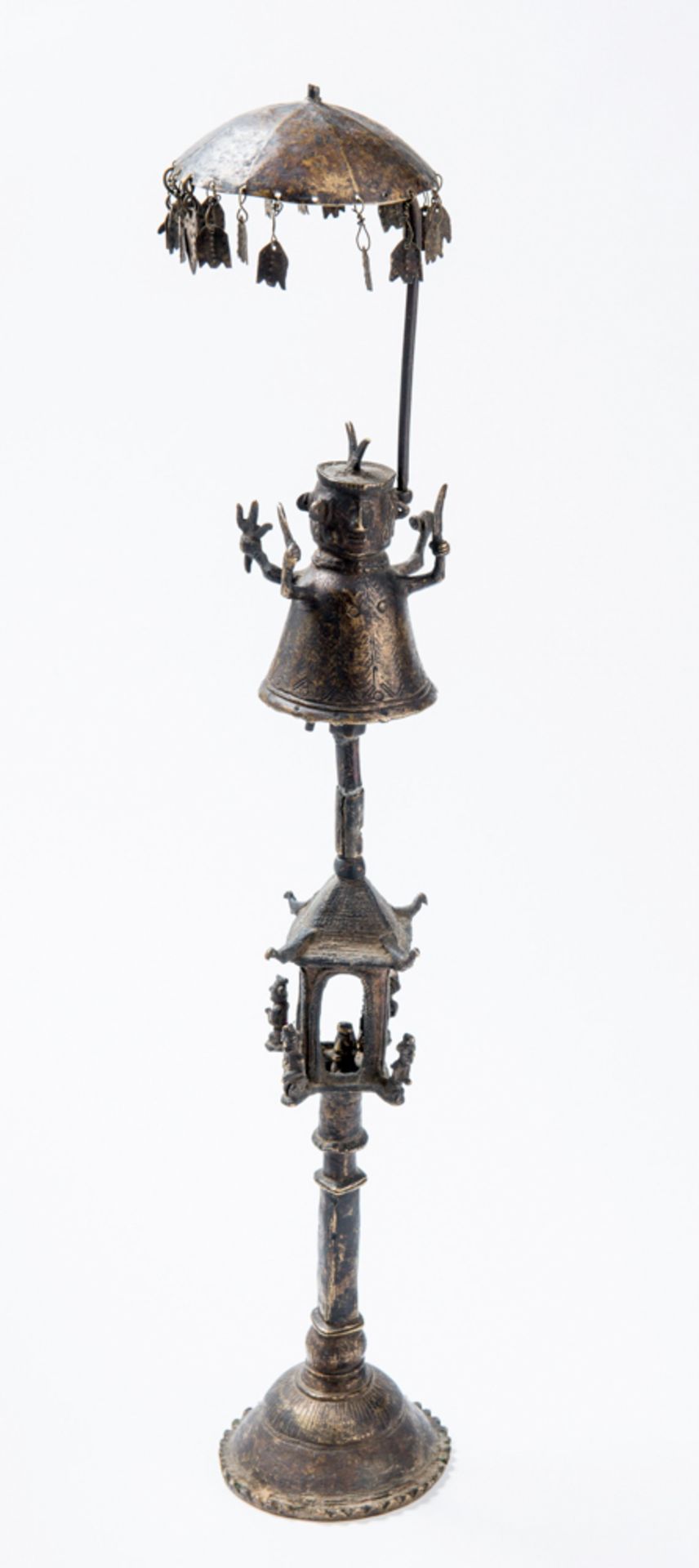 FIGURAL CULT BELL  Bronze. Nepal, possibly 19th century  Unusual multi-parted bronze, raised on a