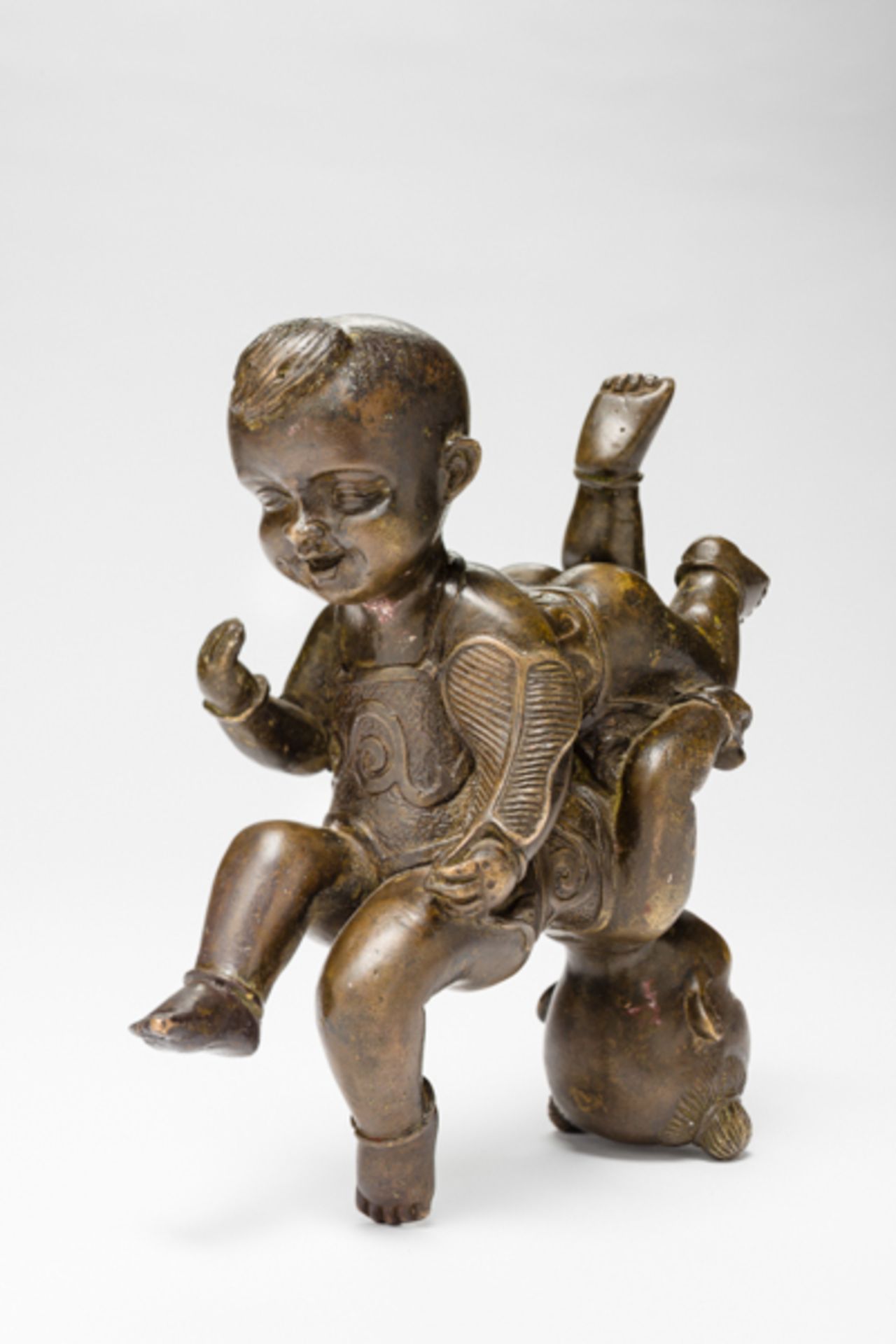 TWO BOYS SYMBOLIZING GOOD FORTUNE  Yellow bronze. China, late Qing – approx. Republic  These two