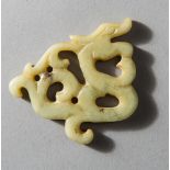 OPENWORK DRAGON AMULET  Jade (Nephrit). China, late Qing, ca 19th cent.  Fine openworked grey