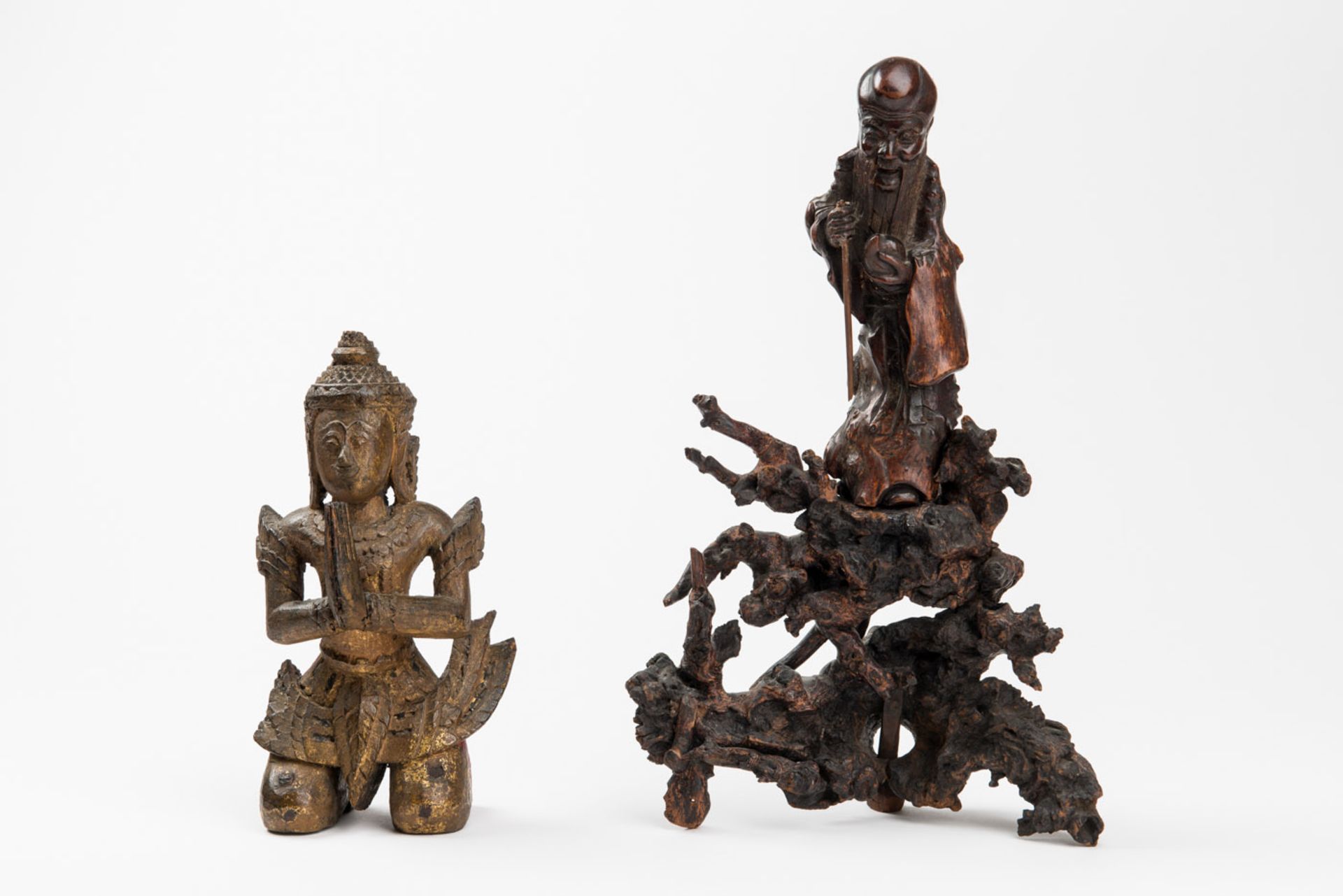 GROUP OF WOOD CARVED ADORANTS AND SHOULAO  Wood, some gilding, root wood, Thailand and China, 19th –
