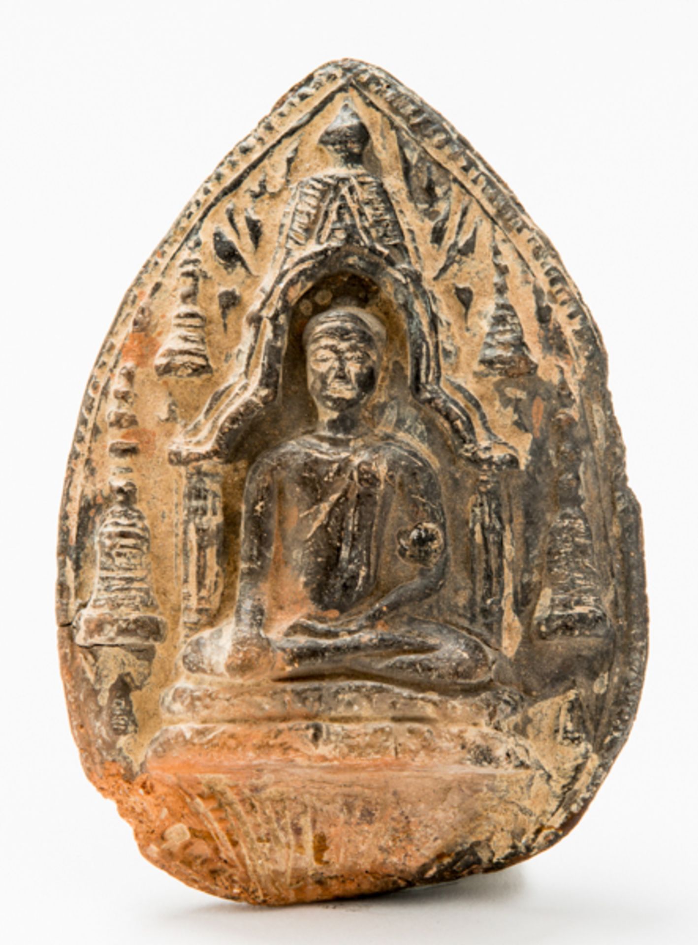 VOTIVE RELIEF DEPICTING BUDDHA  Terracotta. Khmer, 12th – 13th  Buddha is shown seated in