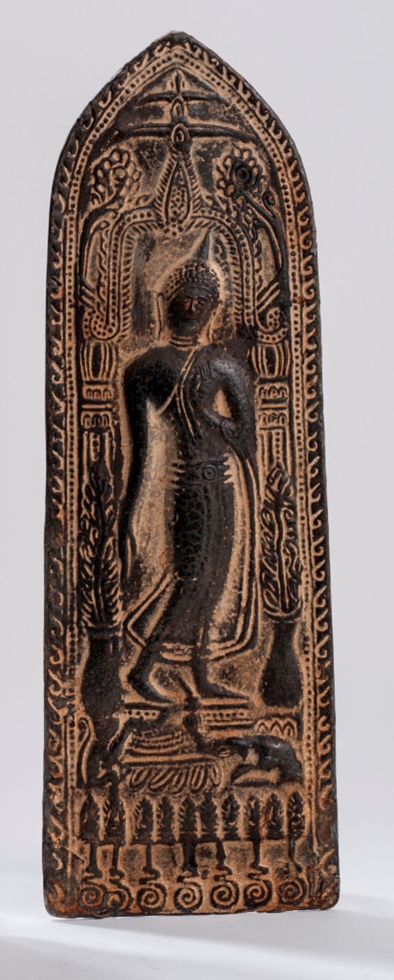A VERY APPEALING DEPICTION OF A WALKING BUDDHA   Panel, metal alloy. Thailand, 19th / 20th cent.