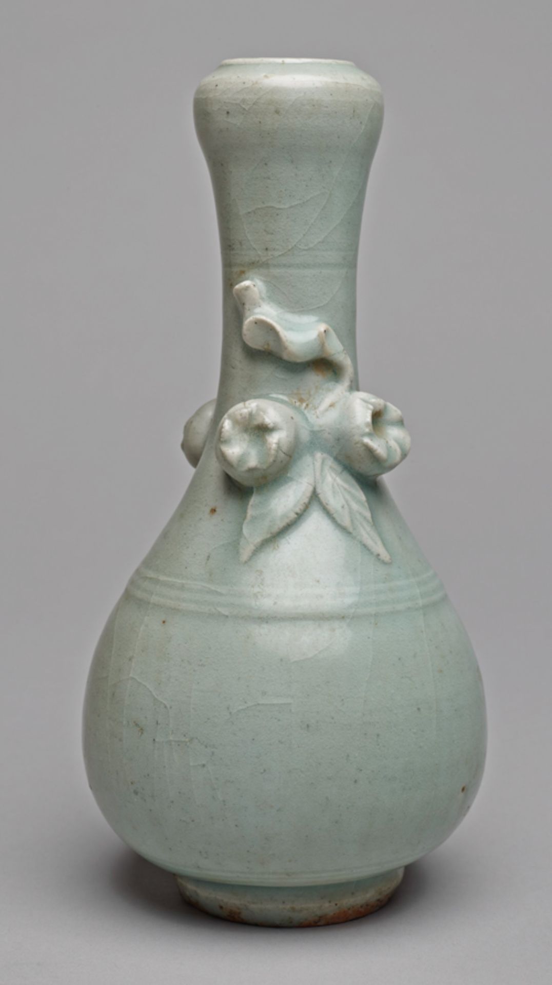 VASE WITH POMEGRANATES AND LIGHT-BLUE GLAZE  Glazed stoneware. China, presumably Ming-Dynasty (