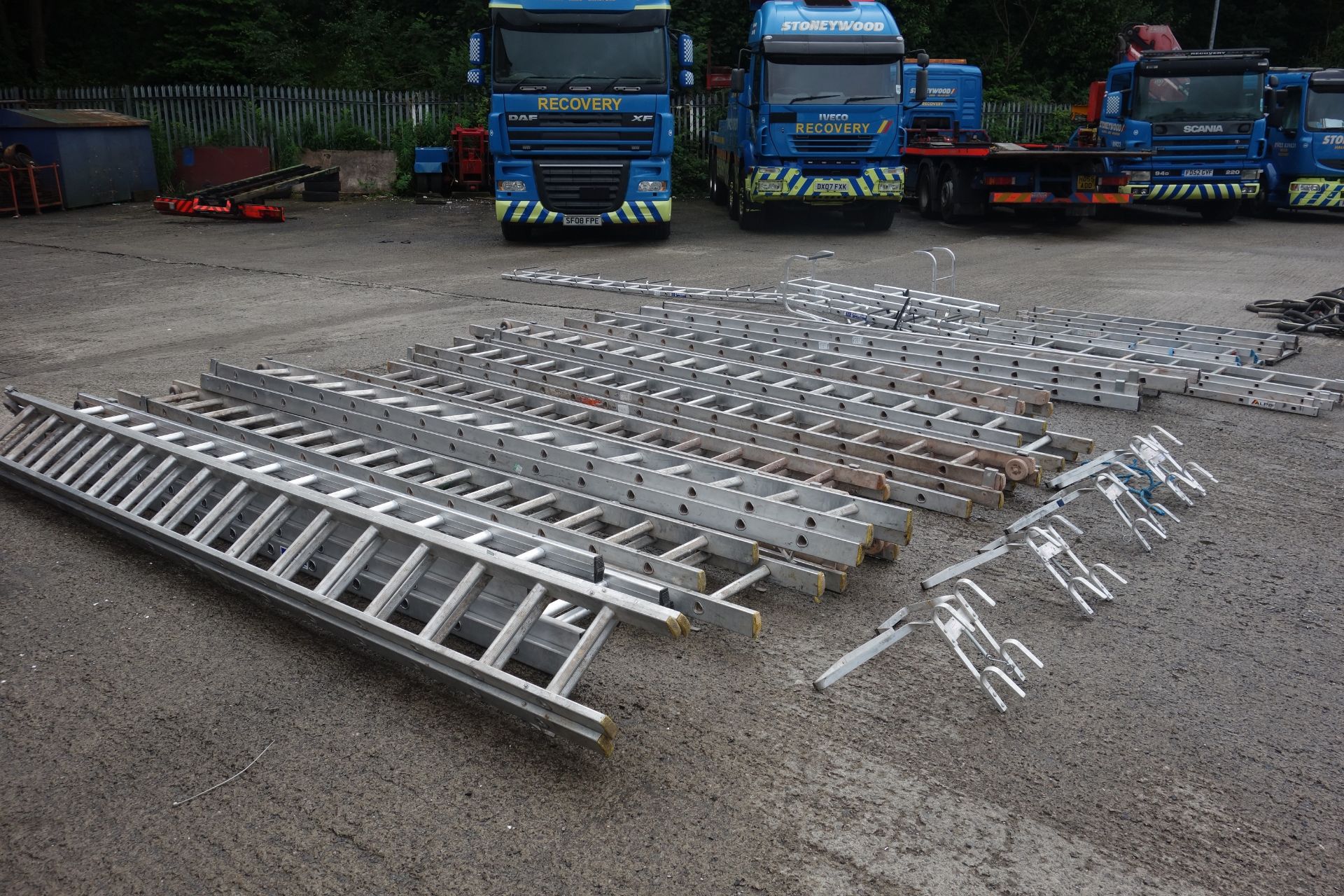 15 ladders as lotted: Four x 4m double extension ladders with wheels (each ladder making 8m in