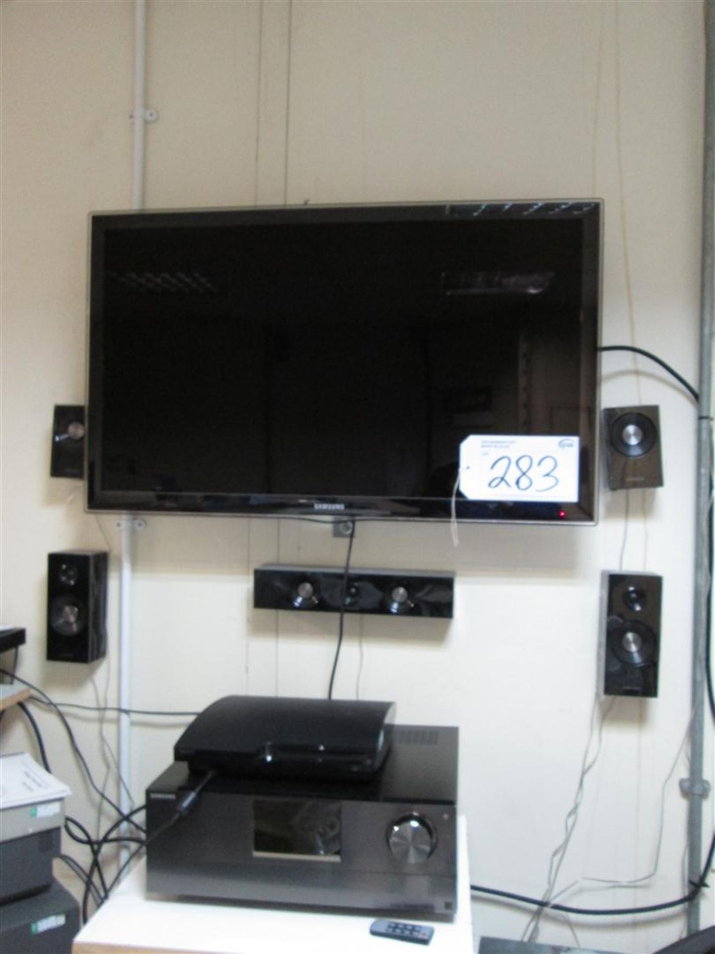 SAMSUNG flat screen television, SONY PS3 PlayStation, 5: speakers, sub-woofer and SAMSUNG HW-C7705