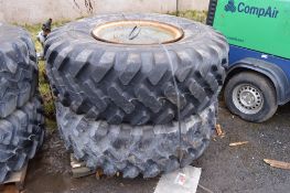 2 - Bridgestone 205/R 25 unused tyres (1 on rim)