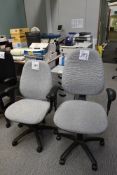 2 - grey upholstered swivel armchairs