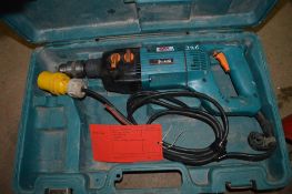 Makita 110v hammer drill c/w carry case 3083918 **Please assume this lot isn't working unless tested