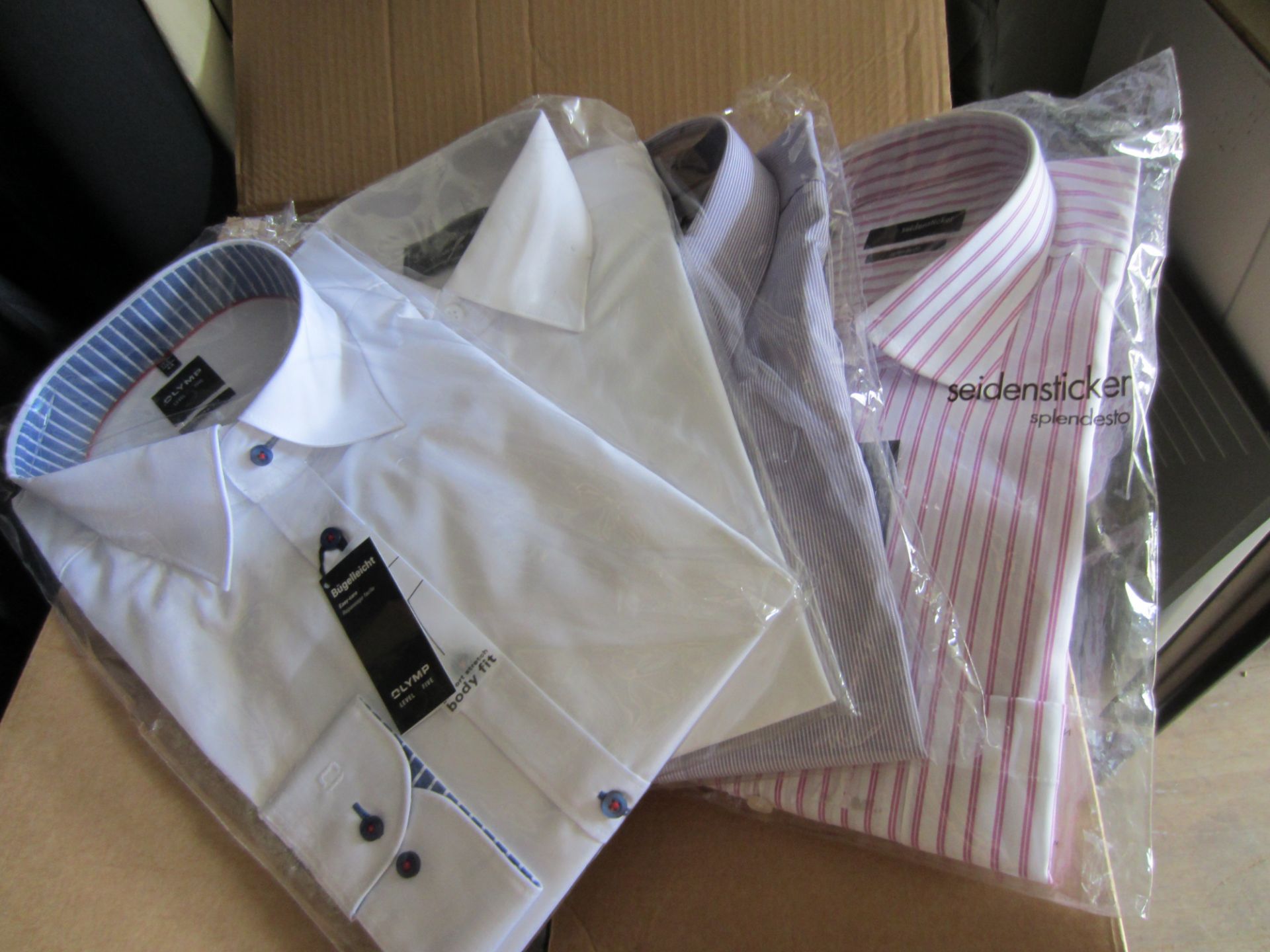 Large Quantity of Stock from a Gents Outfitters, comprising Formal Shirts, Trousers, Ties, Belts