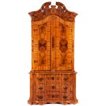 Baroque cabinet-on-chest with fine veneerHeight: 248 cm. Width: 130 cm. Depth: 74 cm. Probably