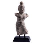 Torso of a LokapalaHeight excluding base: 61 cm. China, Tang dynasty, 618 - 906. Dark stone with